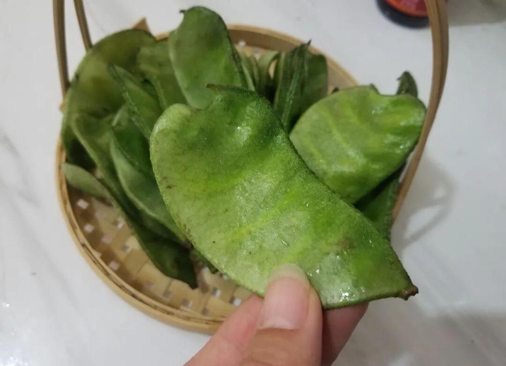 东北的老母猪耳朵豆角照片_老母猪耳朵与紫油豆的美味象征 东北的老母猪耳朵豆角照片_老母猪耳朵与紫油豆的美味象征